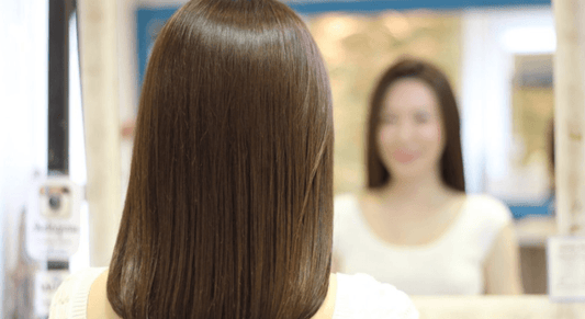 Women Standing in Mirror