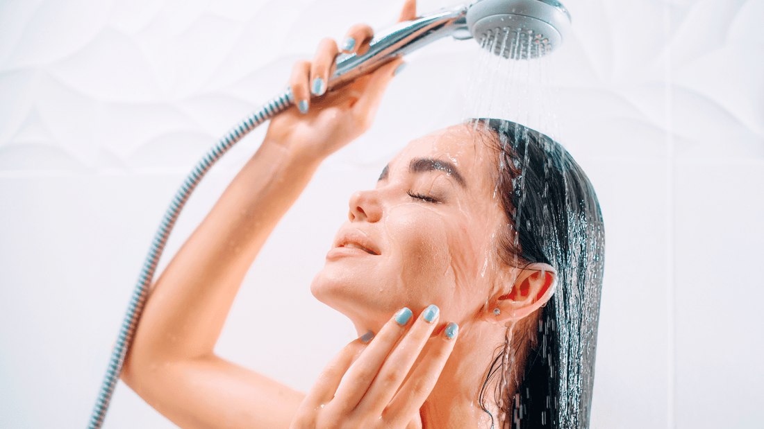 Woman Holding Shower Head