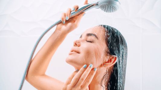 Woman Holding Shower Head
