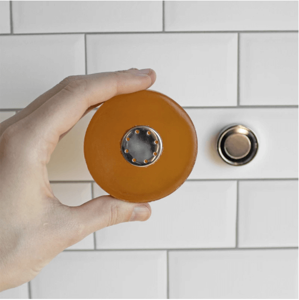 A magnetic soap bar holder