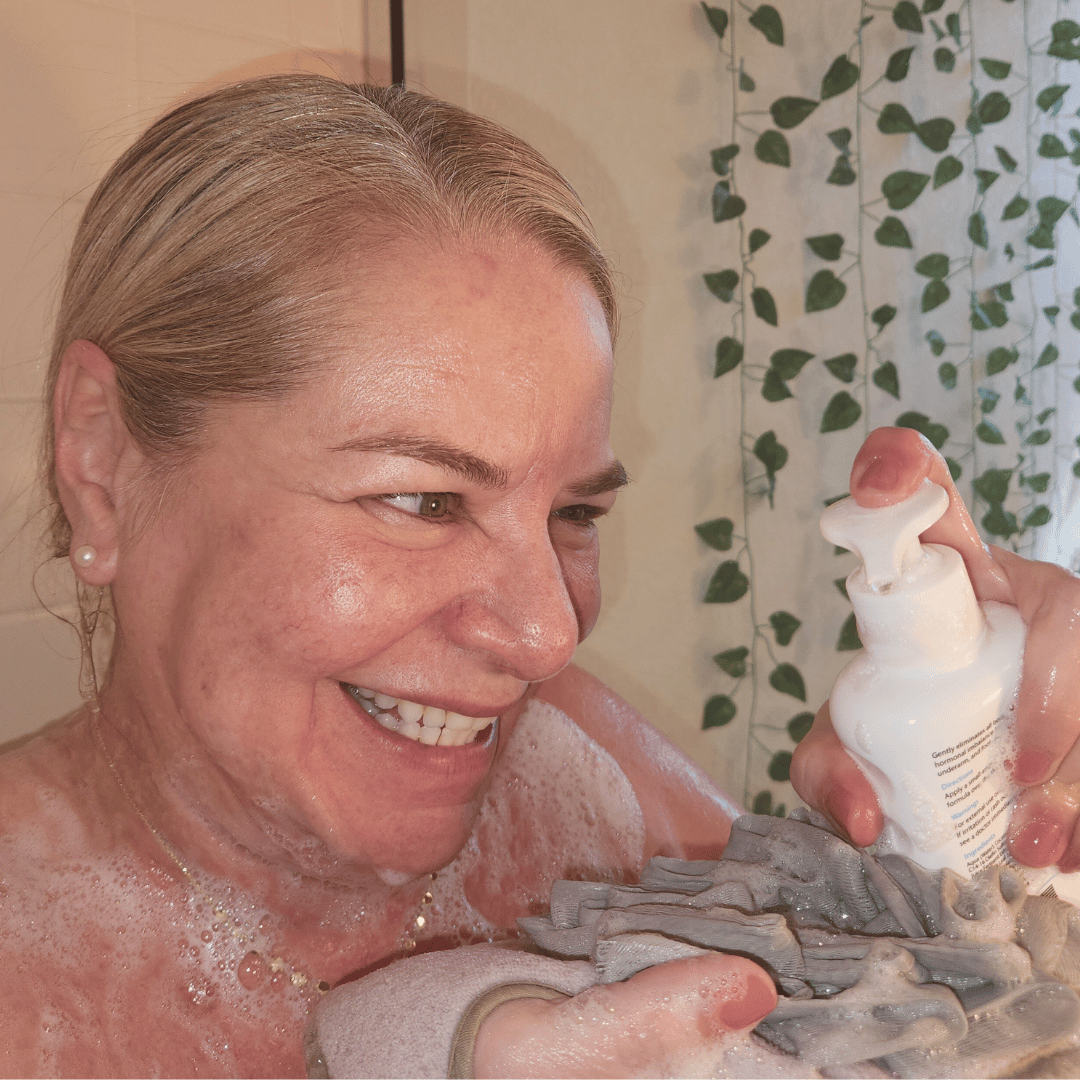 Mirai Clinical's Body Wash and soap sponge in use