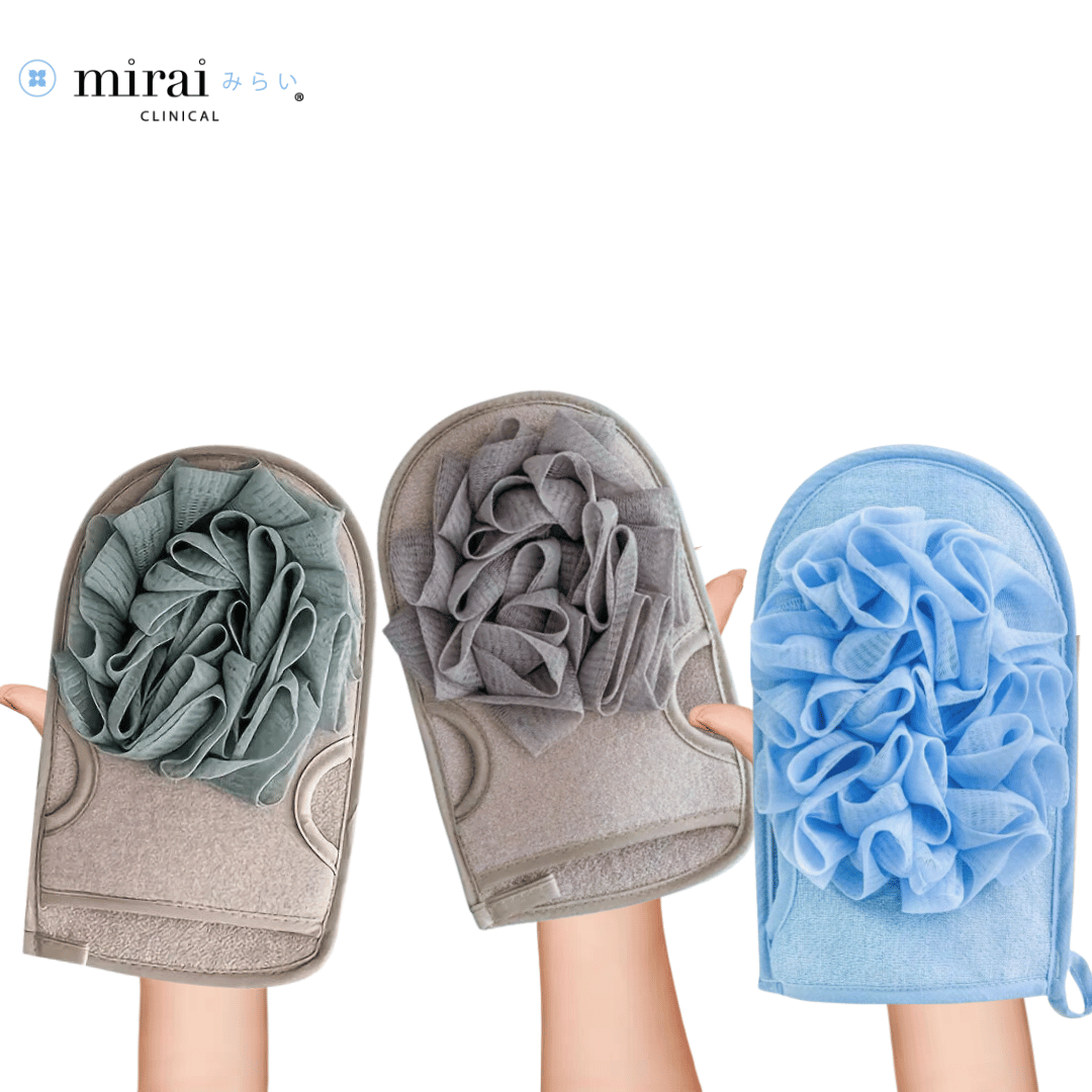 Hand holding Mirai Clinical's soap sponges in green, beige, and blue shades, highlighting their texture and design for optimal cleansing and exfoliation with persimmon-infused benefits
