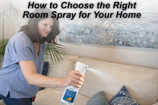 Woman spraying Mirai Clinical deodorizing room spray in a living room