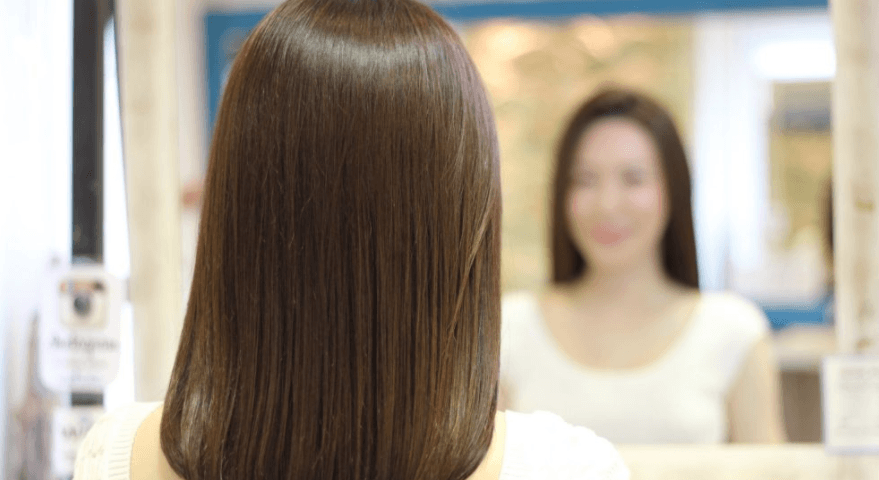 Women Standing in Mirror