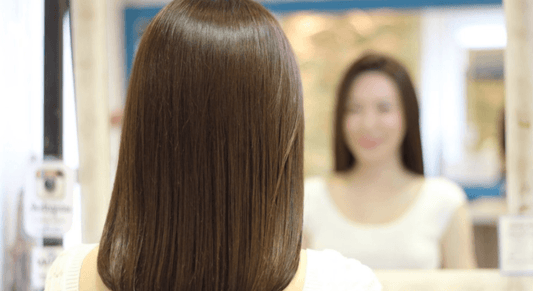 Women Standing in Mirror