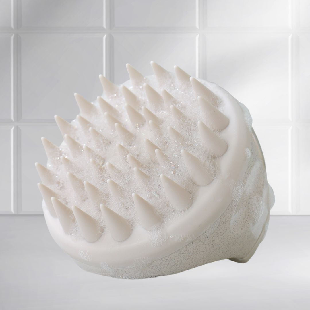 Front view of the Mirai Clinical Scalp Massager with silicone bristles.