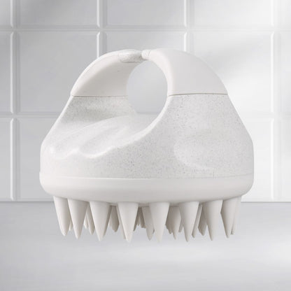 Side view of the Mirai Clinical Scalp Massager with silicone bristles.