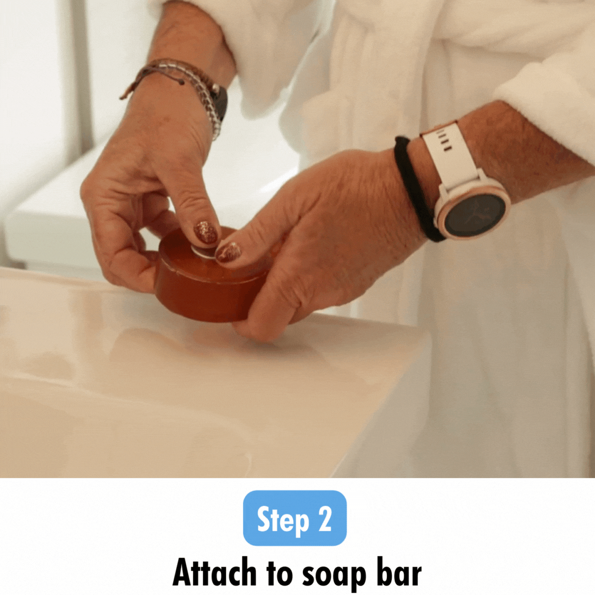 Step 2 of Mirai Clinical magnet usage guide: Demonstrating the correct technique to firmly attach the magnet to the soap bar, ensuring secure placement and prolonged soap life.
