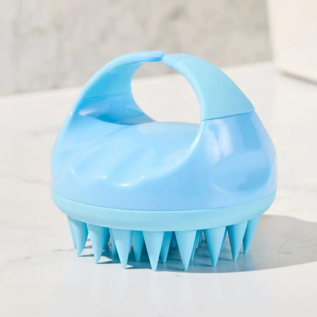 Mirai Clinical scalp massager with soft silicone tips for deep cleansing