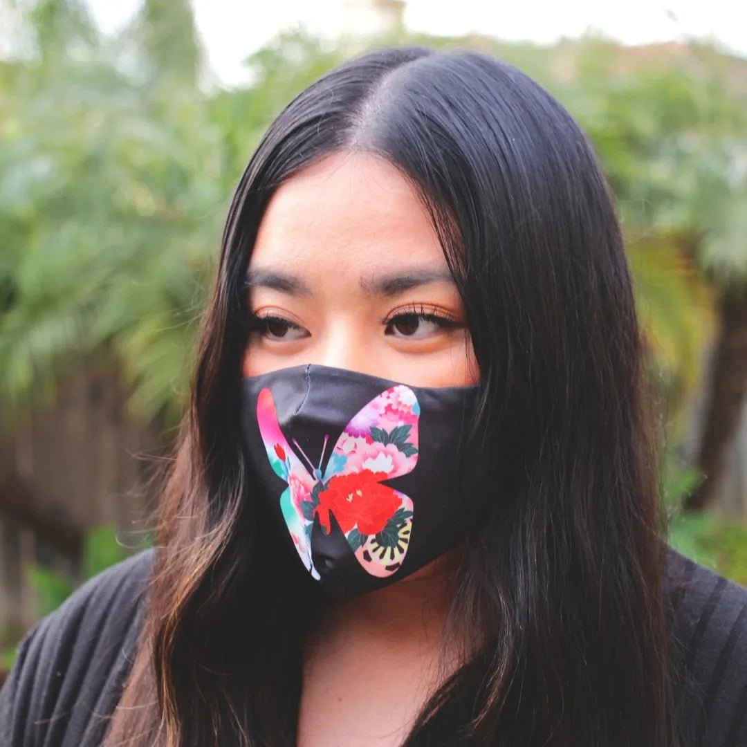 Mirai Clinical black mask with butterfly design, included in the Halloween bundle offer for stylish protection.