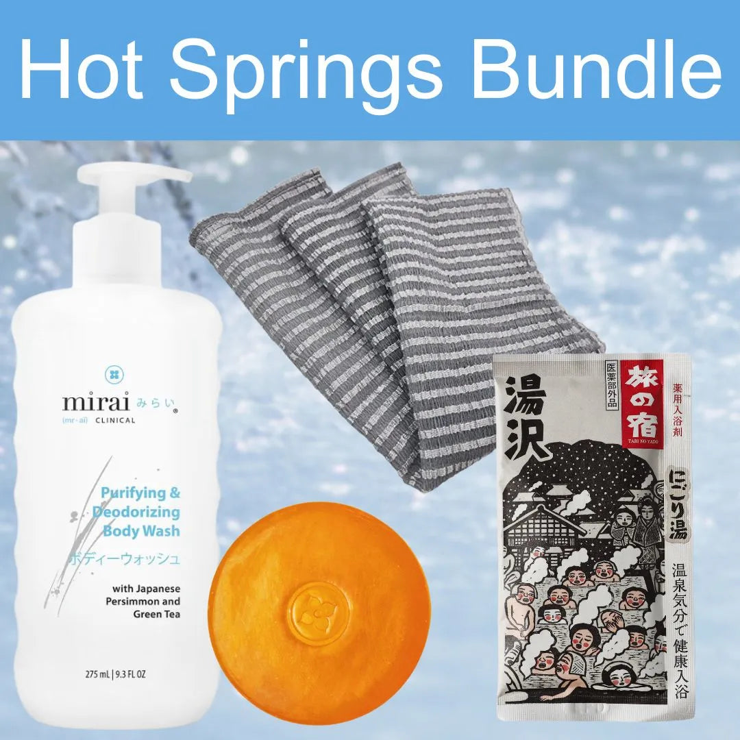 Mirai Clinical Hot Springs Bundle featuring purifying and deodorizing body wash, soap bar, premium towel, and Japanese hot spring bath powder, promoting relaxation and odor control.