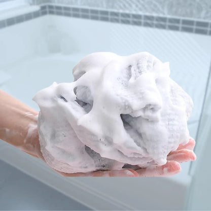 Bubble Rich Bath Towel by Mirai Clinical, creating a luxurious, foamy lather for deep cleansing and exfoliation.