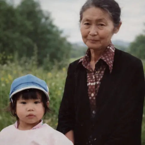 Mirai Clinical founder story image showing a family photo that inspired persimmon deodorizing body care to address Nonenal body odor associated with aging.