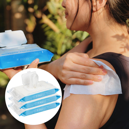 Woman using Mirai Clinical Purifying & Deodorizing Body Wipe on her shoulder, with a 3-pack of wipes shown in the inset.