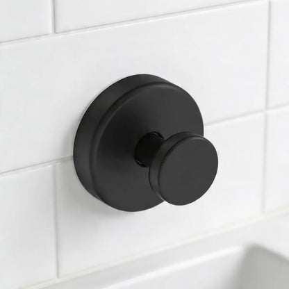 Mirai Clinical no-drill shower hook with strong suction mounted on tile wall, waterproof and rustproof bathroom hook for hanging accessories without damage.