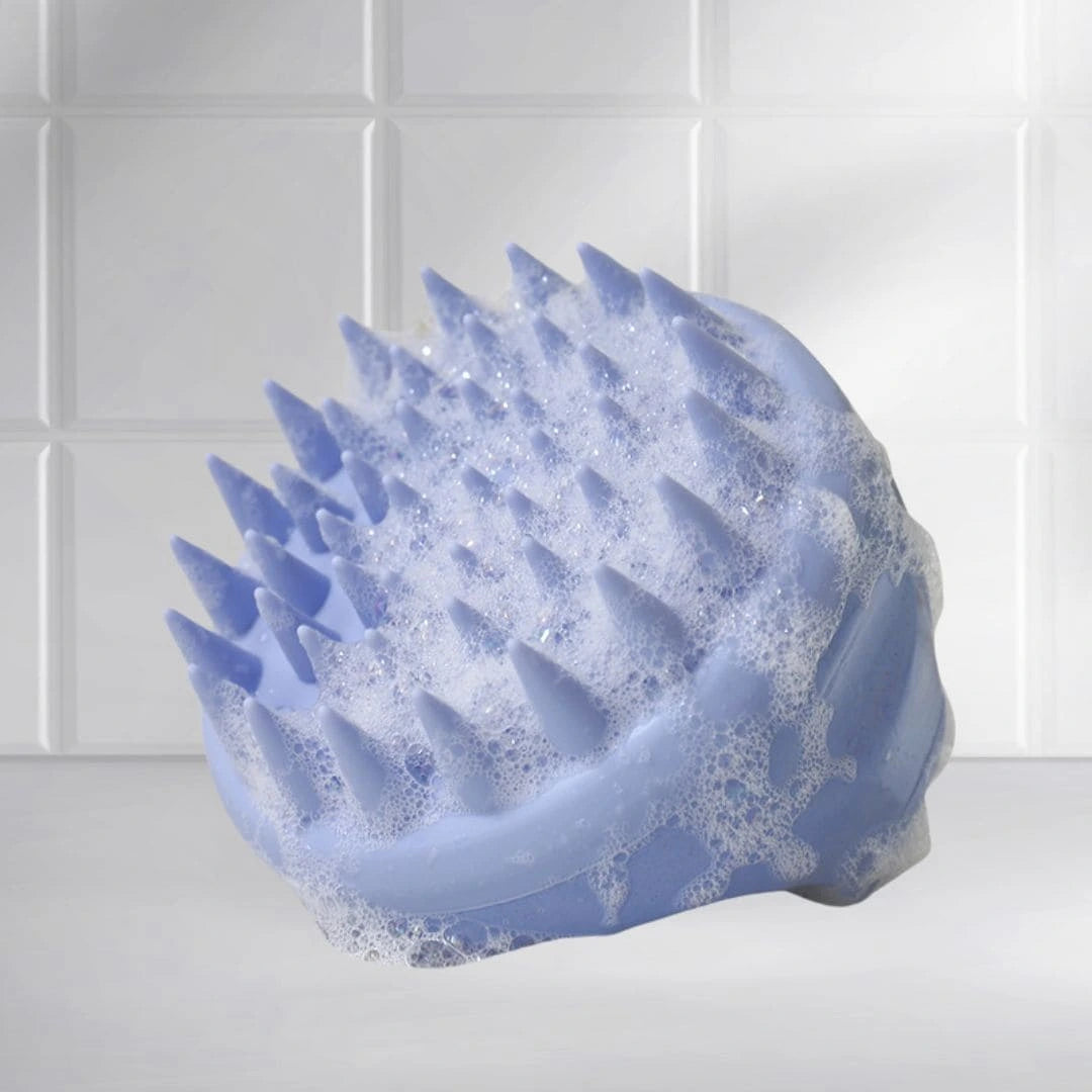 Front view of the Mirai Clinical Scalp Massager with silicone bristles.