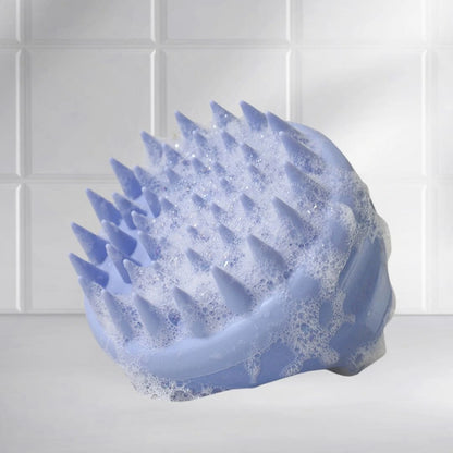 Front view of the Mirai Clinical Scalp Massager with silicone bristles.