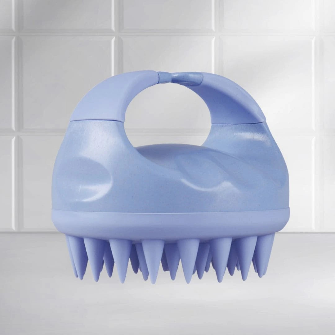 Side view of the Mirai Clinical Scalp Massager with silicone bristles.