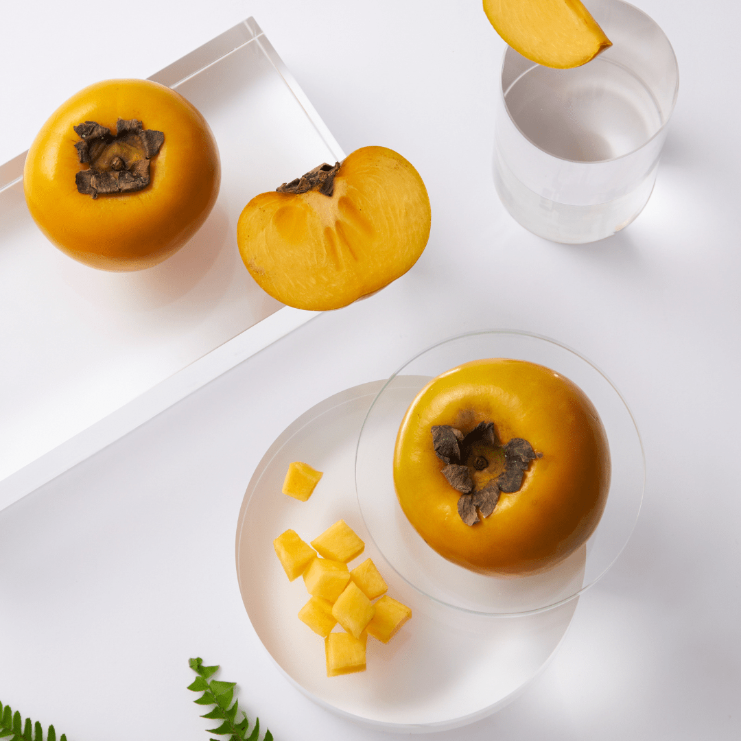 Visual depiction of rich persimmon extract, a key ingredient in Mirai Clinical formulations recognized for its potent deodorizing benefits.