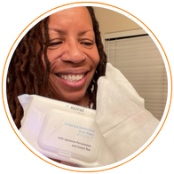 Customer demonstrating Mirai Clinical’s body wipes, infused with natural persimmon extract for effective nonenal and body odor reduction on-the-go.