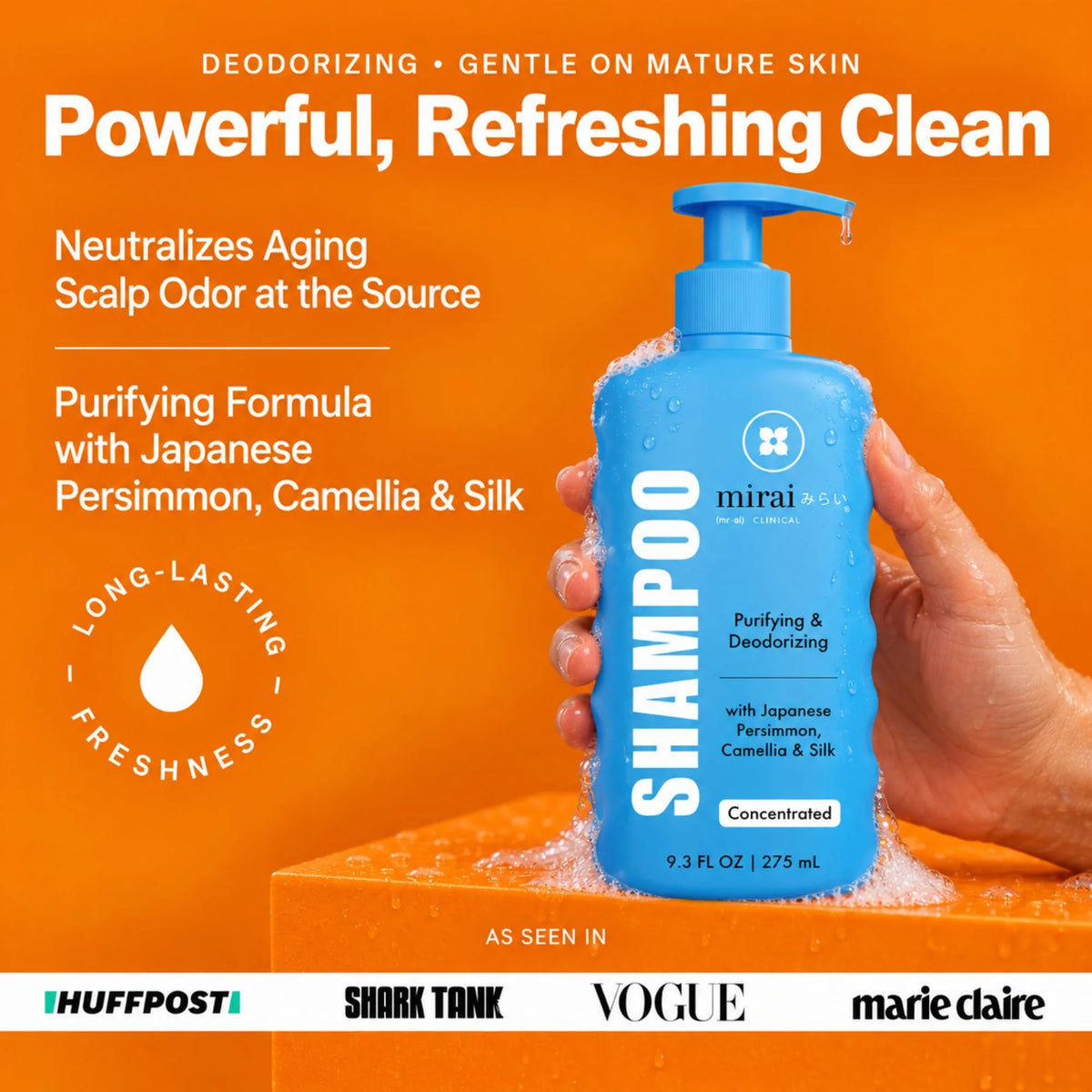 Hand holding a foamy bottle of Mirai Clinical Shampoo on an orange background. Text: Powerful, refreshing clean. Neutralizes aging scalp odor at the source, purifying formula with Japanese persimmon, camellia and silk, long-lasting freshness. As seen in HuffPost, Shark Tank, Vogue and Marie Claire.