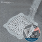Mirai Clinical's hair catcher positioned in a drain, actively trapping hair and debris to prevent clogs and maintain drain cleanliness