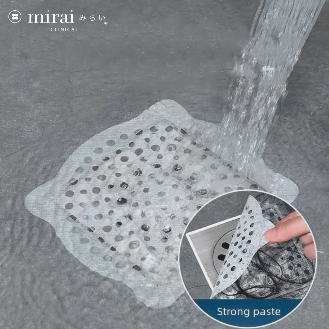 Mirai Clinical's hair catcher positioned in a drain, actively trapping hair and debris to prevent clogs and maintain drain cleanliness