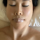 Individual using Mirai Clinical's Sleep Tape, positioned across the nose and mouth, aiding in optimal breathing for a restful night's sleep.