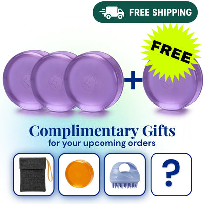 Four translucent purple oval bath or body soaps are shown on a white background with promotional text reading 'FREE SHIPPING' and 'Complimentary Gifts for your upcoming orders,' plus a yellow 'FREE' burst and small gift box icons below.