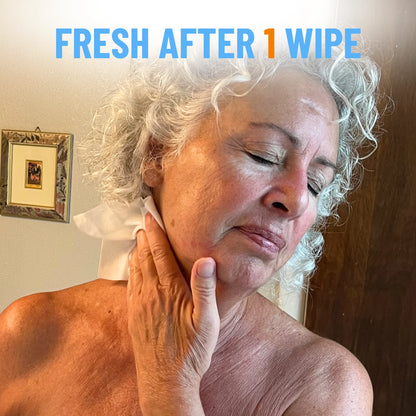 Mature woman feeling fresh after one use of persimmon deodorizing body wipes targeting nonenal body odor