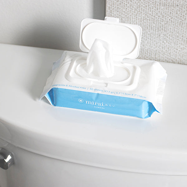 Mirai Clinical's purifying and deodorizing body wipes with persimmon extract, displayed in a bathroom setting, designed to combat nonenal body odor.