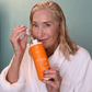 Woman Smelling Shampoo